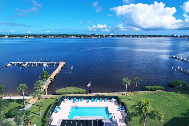 birds eye view of property featuring a water view