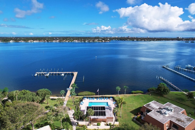 birds eye view of property featuring a water view