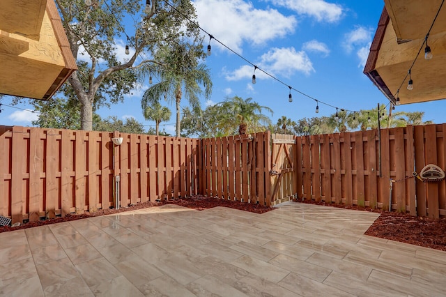 view of patio with a fenced backyard