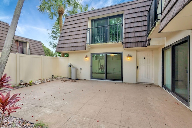 rear view of house featuring a patio area