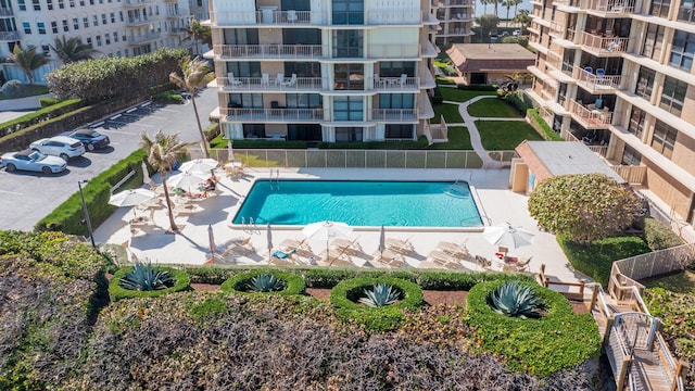 view of swimming pool with a patio area