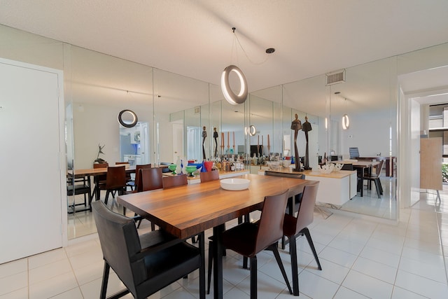 view of tiled dining space