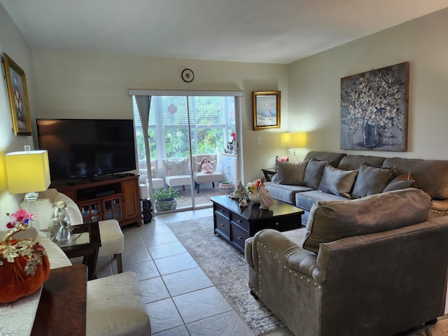 living room with light tile patterned flooring