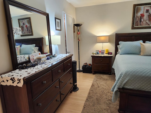 bedroom with light hardwood / wood-style flooring