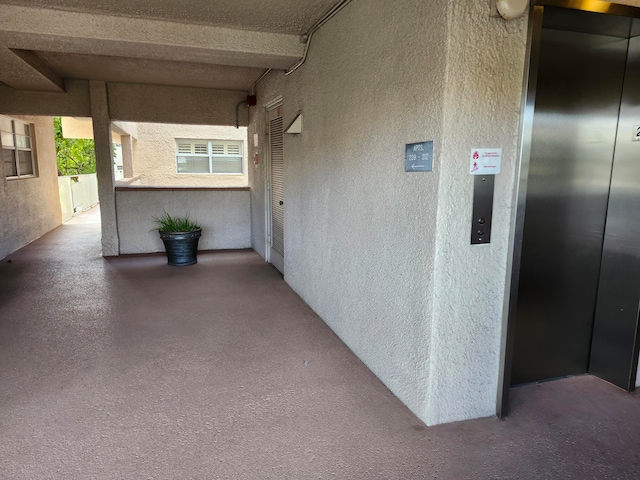 view of patio with elevator