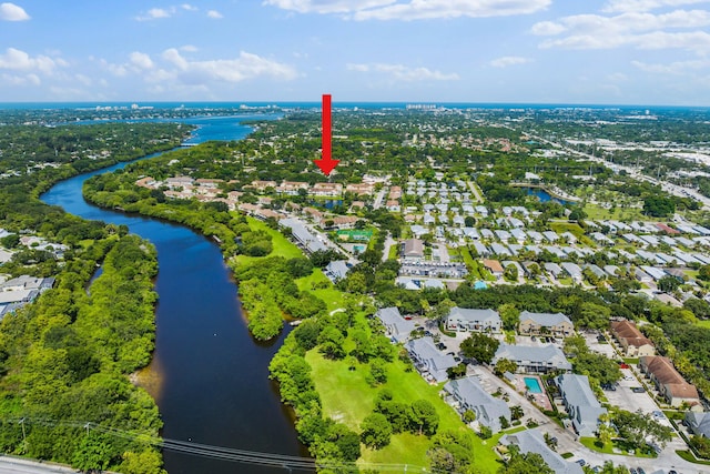 bird's eye view with a water view