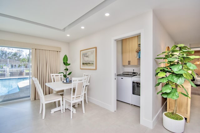 dining area featuring washing machine and clothes dryer