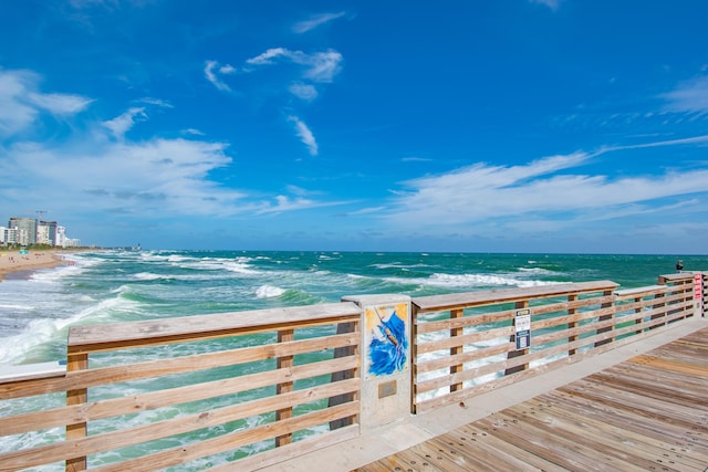 view of water feature with a beach view