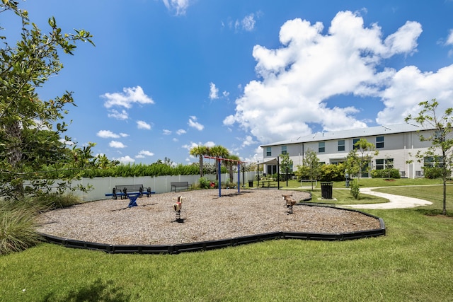 view of jungle gym with a yard