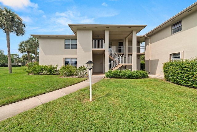 27 Lake Vista Trl Unit 107, Port Saint Lucie, FL 34952 - view of property featuring stairs