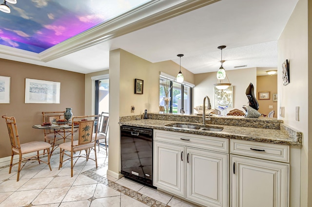 kitchen with pendant lighting, a raised ceiling, stone countertops, a sink, and dishwasher