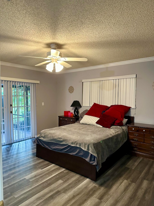 bedroom with hardwood / wood-style floors, ceiling fan, a textured ceiling, and access to exterior