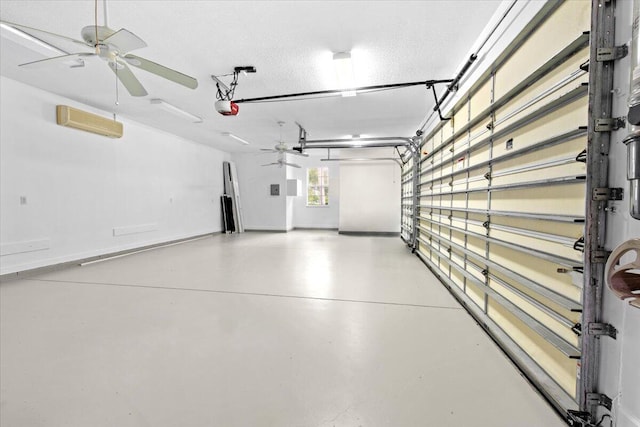 garage featuring a garage door opener and ceiling fan