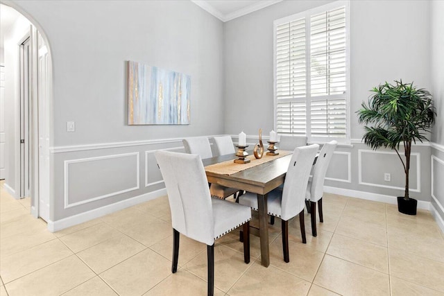 tiled dining space with ornamental molding