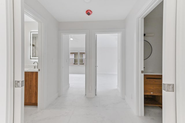 hallway featuring sink