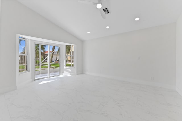 empty room featuring lofted ceiling and ceiling fan