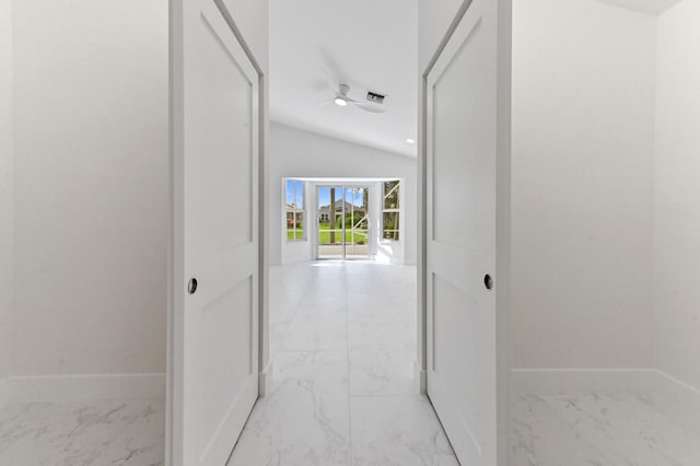 corridor with lofted ceiling