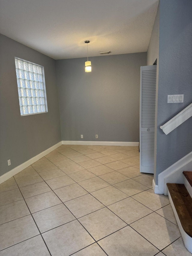 view of tiled empty room