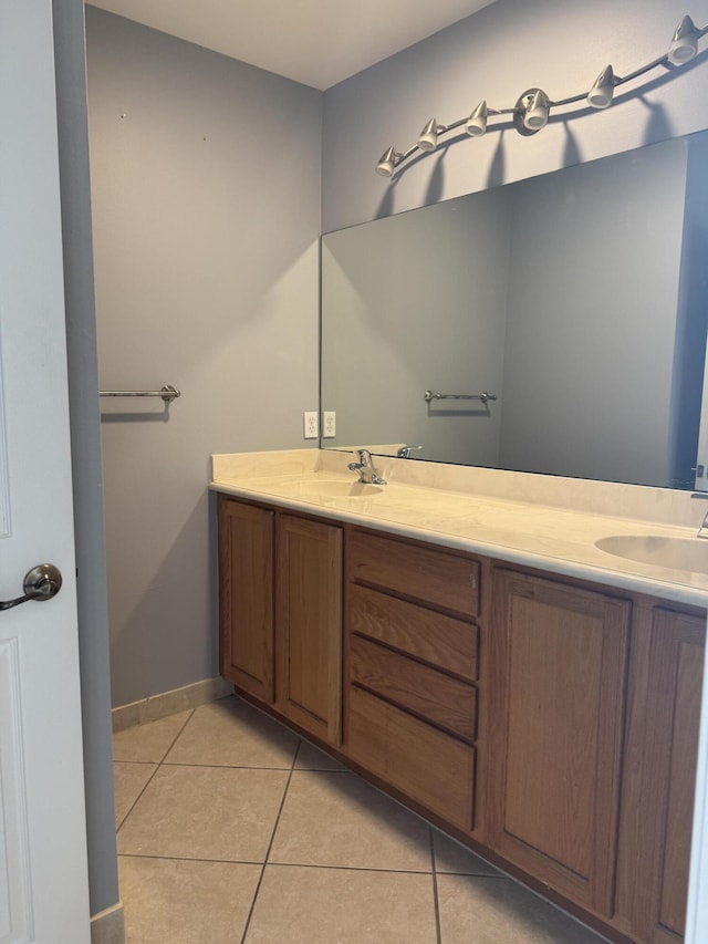 bathroom with vanity and tile patterned floors