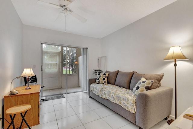 tiled living room featuring ceiling fan