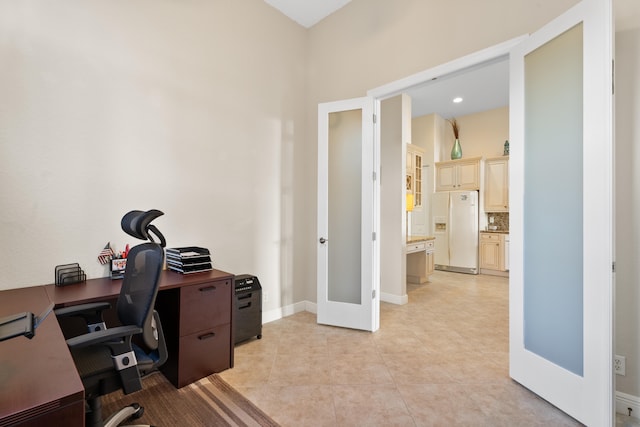 tiled home office featuring french doors