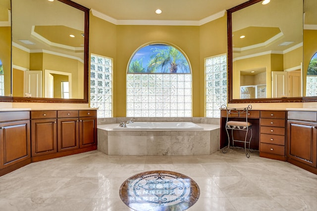 bathroom with ornamental molding, vanity, and separate shower and tub