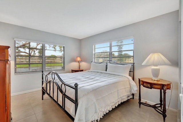 bedroom featuring light tile patterned floors