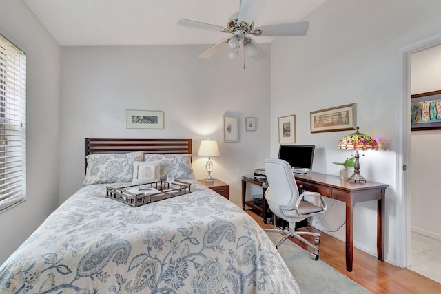 bedroom featuring ceiling fan and light hardwood / wood-style floors