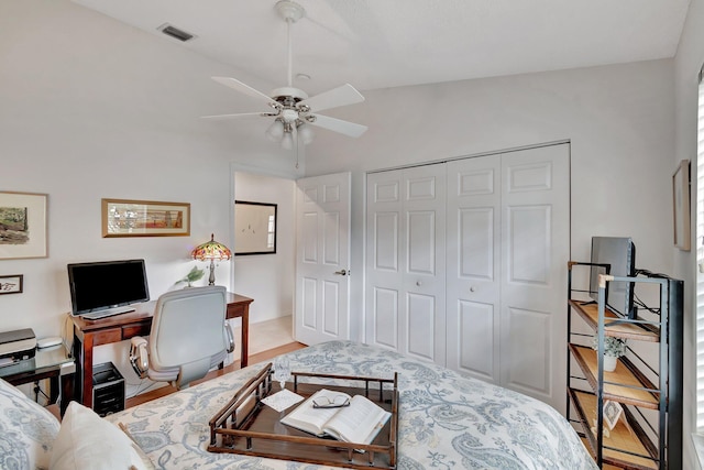 office with ceiling fan, lofted ceiling, and light hardwood / wood-style flooring