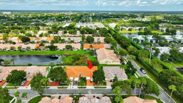 bird's eye view with a water view