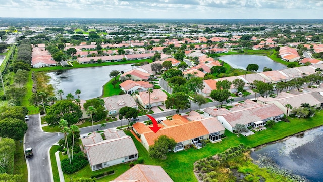 bird's eye view with a water view