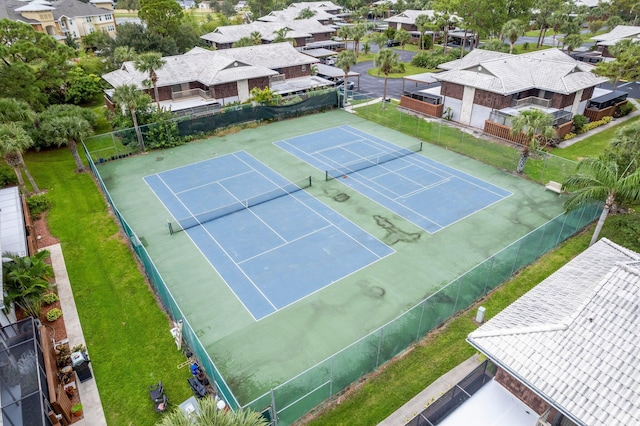 birds eye view of property with a residential view