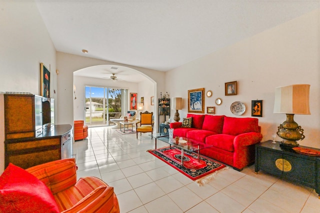 living room featuring ceiling fan and light tile patterned floors