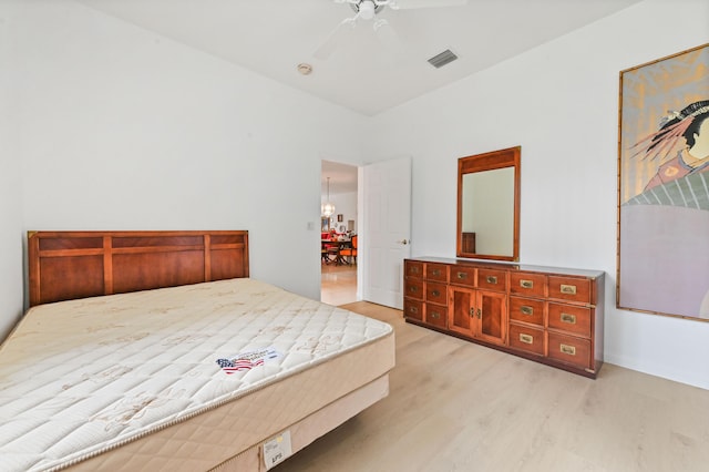 bedroom featuring ceiling fan and light wood-type flooring