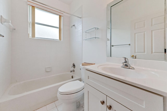 full bathroom featuring tile patterned floors, vanity, toilet, and tiled shower / bath