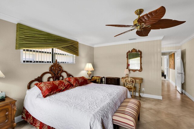 tiled bedroom featuring ceiling fan and crown molding