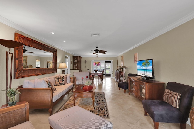 living room with ornamental molding, ceiling fan, and light tile patterned flooring