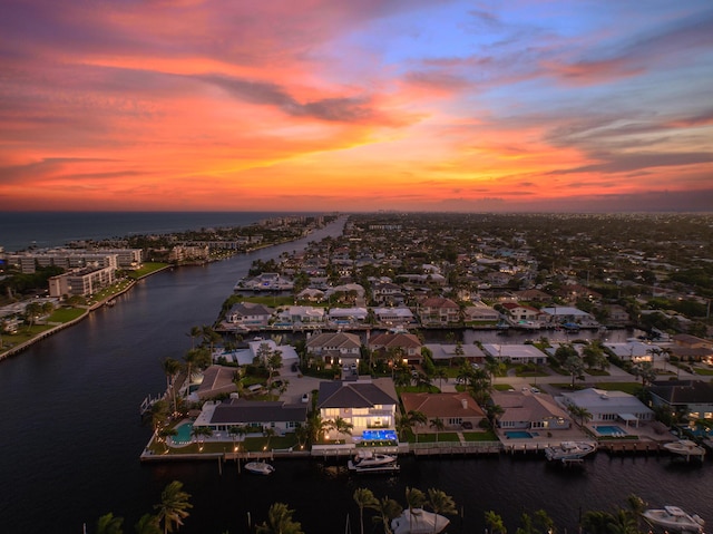 aerial view with a water view and a residential view