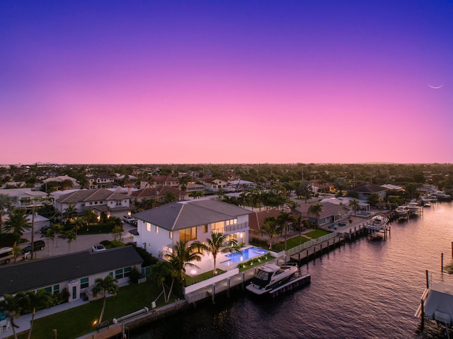 aerial view with a residential view and a water view