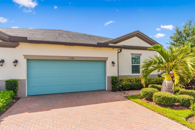 single story home with a garage