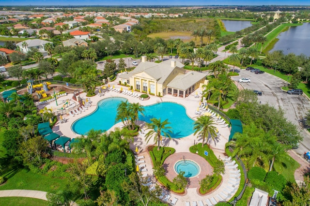 bird's eye view with a water view