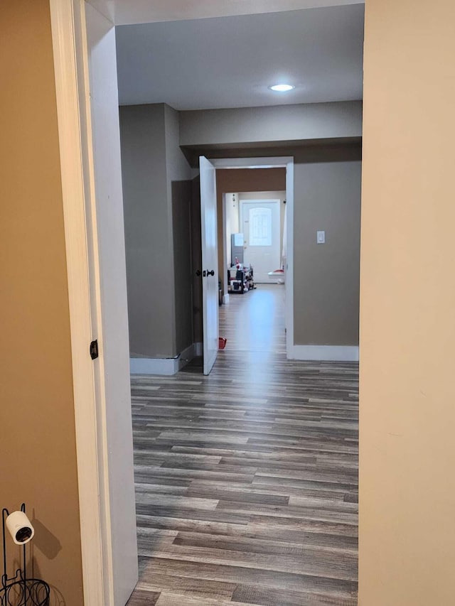 hall with dark hardwood / wood-style floors