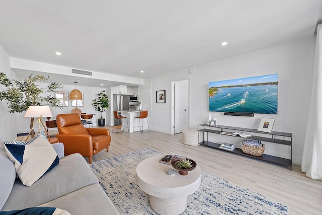 living room featuring light hardwood / wood-style floors