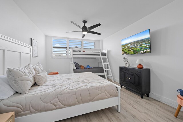 bedroom featuring ceiling fan and light hardwood / wood-style floors