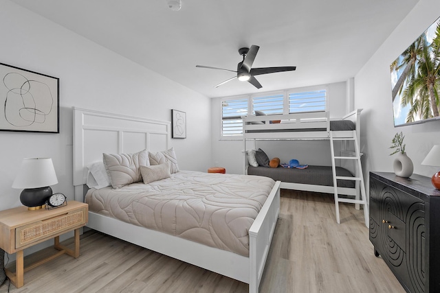 bedroom featuring ceiling fan and light hardwood / wood-style flooring