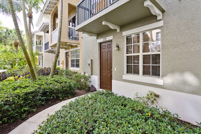 112 W Coda Cir, Delray Beach, FL 33444 - entrance to property with stucco siding