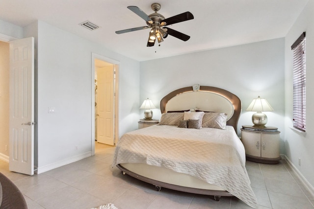 bedroom featuring ceiling fan and light tile patterned floors