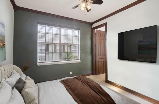 tiled bedroom featuring ceiling fan, crown molding, and multiple windows