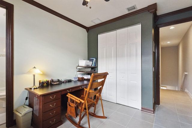 home office featuring light tile patterned floors and ornamental molding