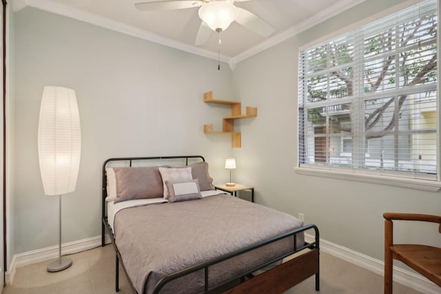 tiled bedroom with ceiling fan and ornamental molding